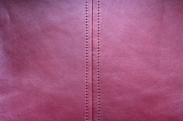Natural purple leather. Violet leather texture.
