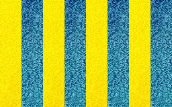 Texture of natural leather in blue and yellow colors