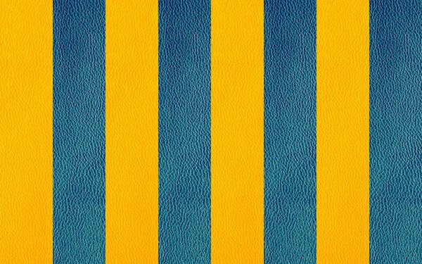 Texture of natural leather in blue and yellow colors
