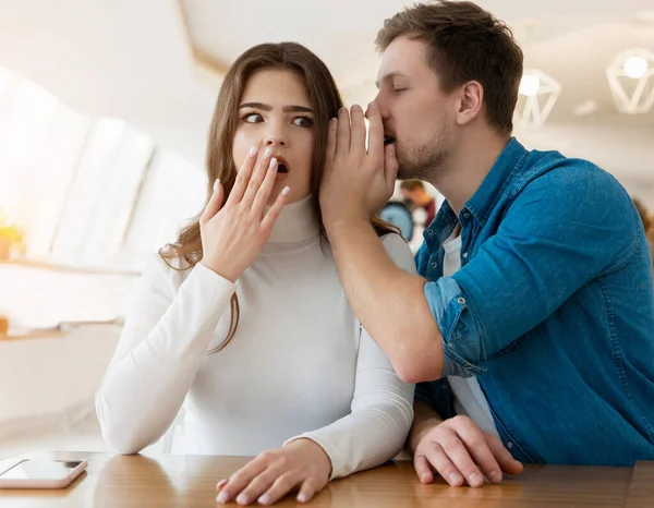 Young Couple Sitting Cafe Handsome Man Whispers Something Private Beautiful — Stock Photo, Image