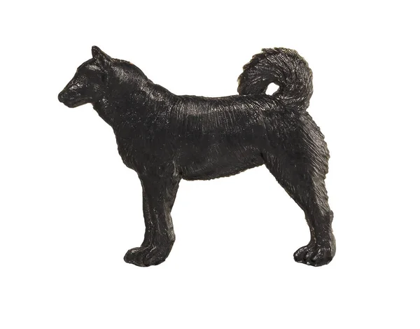 Schwarze Hundefigur auf weißem Hintergrund, laika — Stockfoto