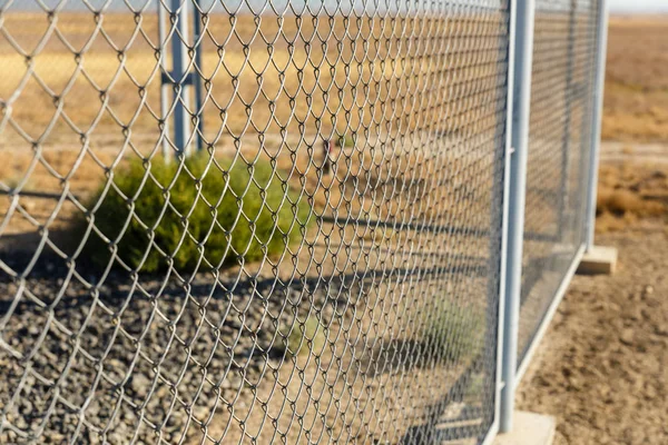 Metal wire fence or wire mesh steel — Stock Photo, Image