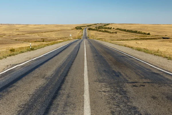empty asphalt road across the steppe, Kazakhstan, Khromtau District, Highway M32