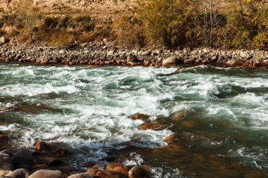 stormy mountain river in the Naryn region of Kyrgyzstan, Kokemeren river clipart