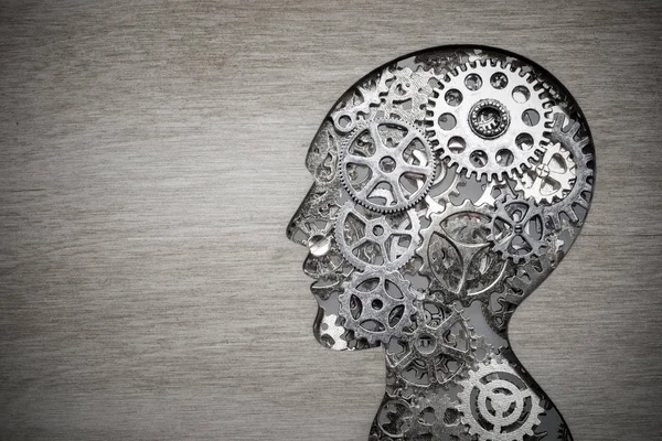 Brain model concept made from gears and cogwheels on wooden background — Stock Photo, Image