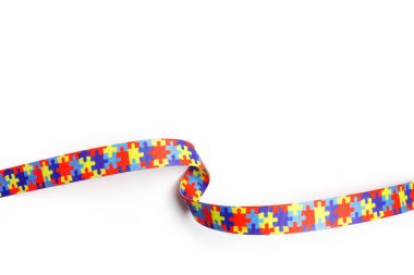 World Autism awareness and pride day with Puzzle pattern ribbon isolated on white clipart