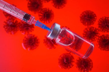 Şırınga ve virüs geçmişi olan Corona virüs aşısı konsepti. Aşı Coronavirus 'a karşı savaş kavramı.