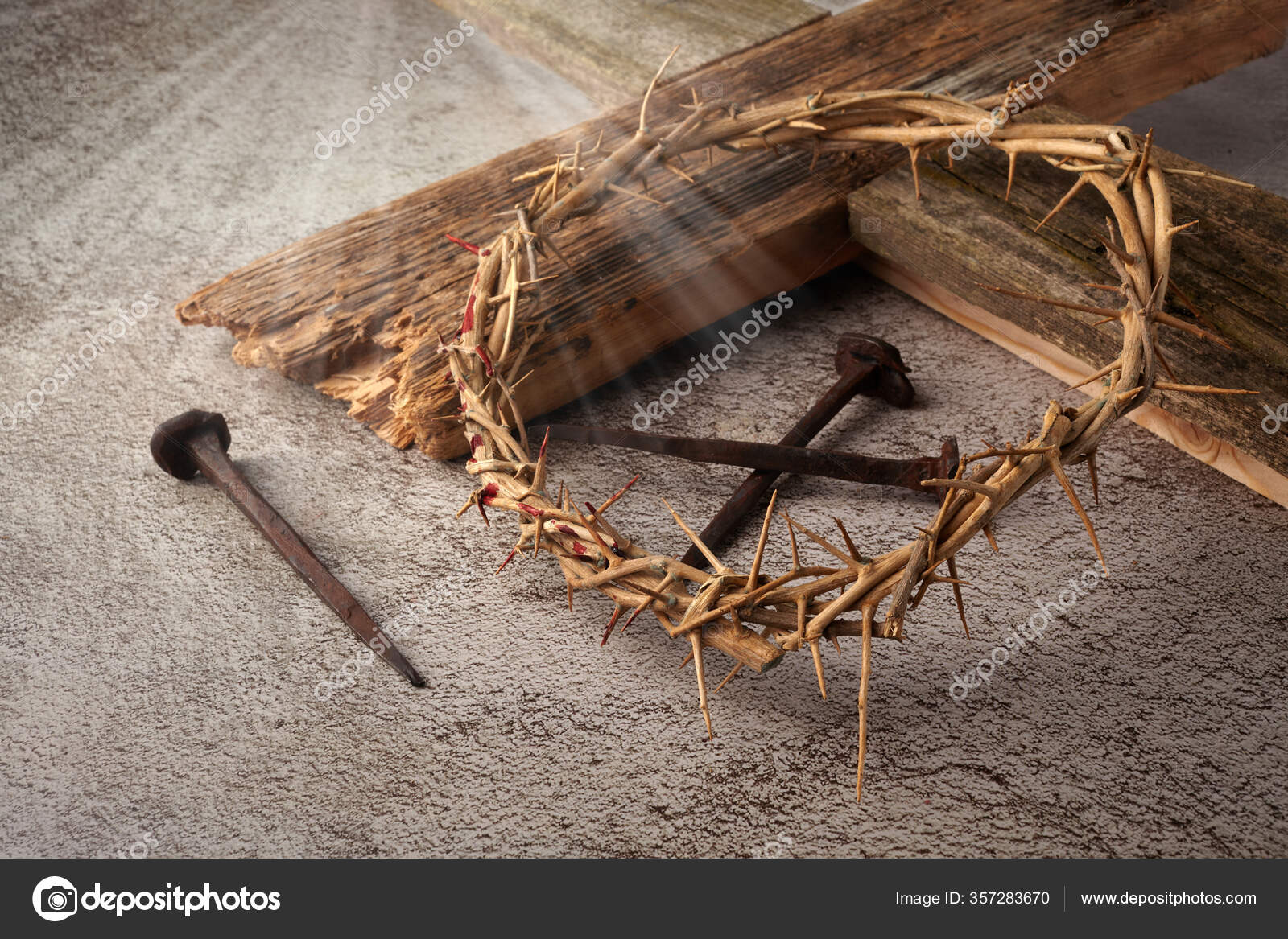 Easter background depicting the crucifixion with a rustic wooden cross, crown of thorns and