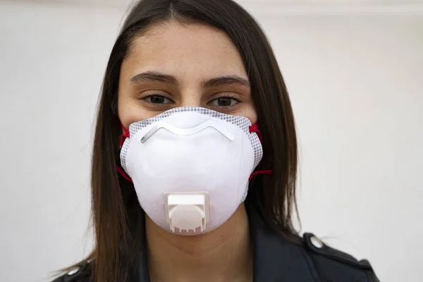 Woman with a doctor mask. Breathing medical respiratory mask. Virus Protection.