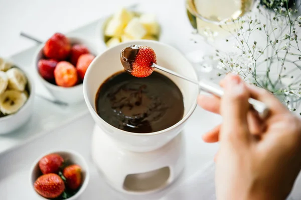 Chocolate fondue served in a restaurant — Stock Photo, Image