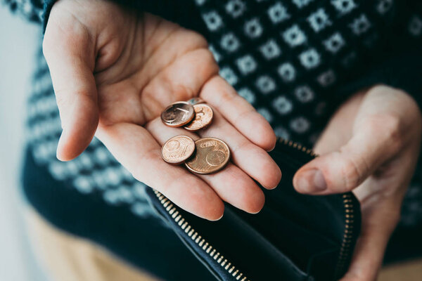 Hands holding currency