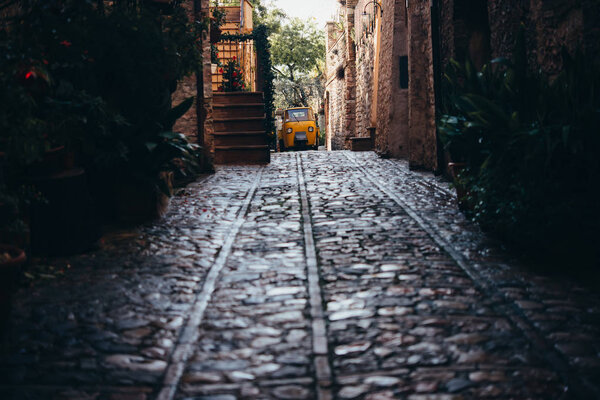 View of the small street in Spello, a small town in Umbria, Italy.