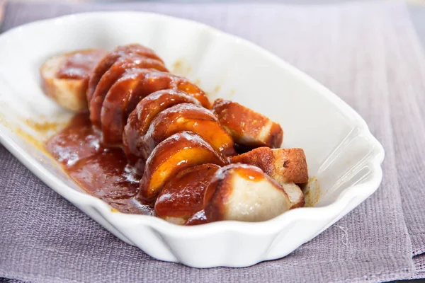 Grilled sausage with ketchup — Stock Photo, Image