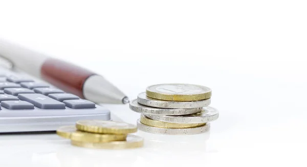 Euro coins and calculator — Stock Photo, Image