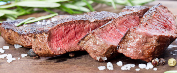 Medium rare grilled steak sliced up