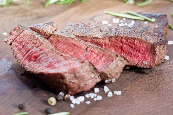 Medium rare grilled steak sliced up Royalty Free Stock Photos