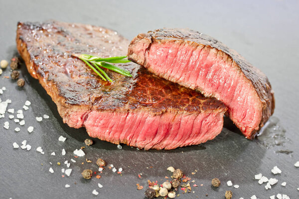 Medium grilled steak with salt and pepper