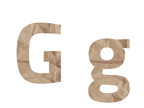 Алфавіт шрифту літери G Lettring ізольовано на білому. Скраплений обгортковий папір текстурований ефект, синяк тріщини складки. Ізольований паперовий лист англійською мовою — стокове фото