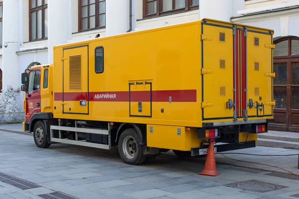 Moscow, Russia - January 26, 2020: Yellow red emergency vehicle. City service for the elimination of accidents, sewage blockages and gas leaks. Truck branded in emergency service colors — Stock Image Moscow, Russia - January 26, 2020: Yellow red emergency vehicle. City service for the elimination of accidents, sewage blockages and gas leaks. Truck branded in emergency service colors Stock Image