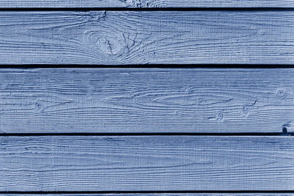 La texture des planches en bois naturel teinté en bleu classique. Toile de fond effet texturé, design — Photo