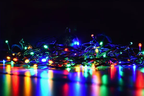 Christmas Lights Black Background Copy Space Colored Reflecting Surface — Stock Photo, Image