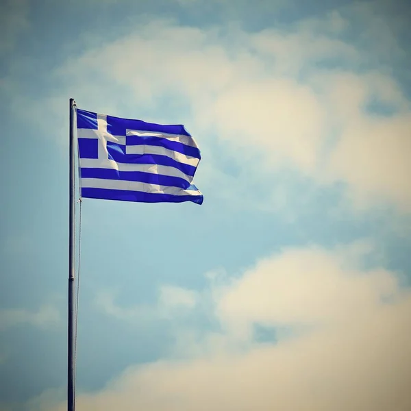 Flag of Greece Flying in Wind and Blue Sky. Summer background for travel and holidays. Greece Crete. — Stock Photo, Image