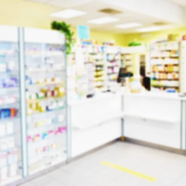 Fondo Borroso Interior Una Farmacia Con Productos Vitrinas Medicamentos Vitaminas — Foto de Stock