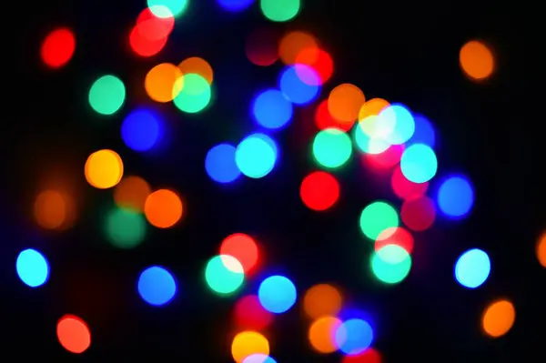 Streszczenie tła Bożego Narodzenia, tekstury xmas z kolorowymi lampkami na choinkę. — Zdjęcie stockowe