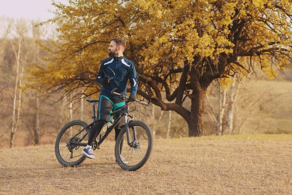 Cyclist Rides Autumn Forest Park — Stock Photo, Image