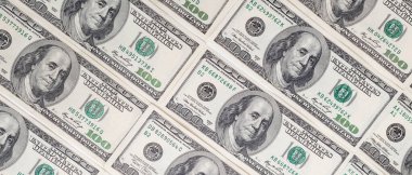 Dokuma Amerikan doları manzarası. Yüz dolarlık banknotların arka planı.