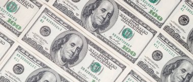 Dokuma Amerikan doları manzarası. Yüz dolarlık banknotların arka planı.