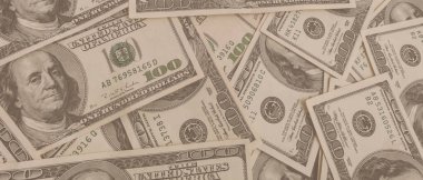 Dokuma Amerikan doları manzarası. Yüz dolarlık banknotların arka planı.