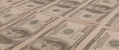 Dokuma Amerikan doları manzarası. Yüz dolarlık banknotların arka planı.