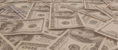 Dokuma Amerikan doları manzarası. Yüz dolarlık banknotların arka planı.