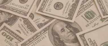 Dokuma Amerikan doları manzarası. Yüz dolarlık banknotların arka planı.