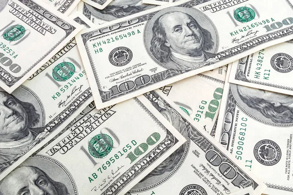 Amerikan doları dokusu. Yüz dolarlık banknotların arka planı.