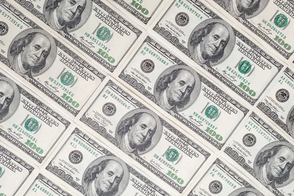 Amerikan doları dokusu. Yüz dolarlık banknotların arka planı.