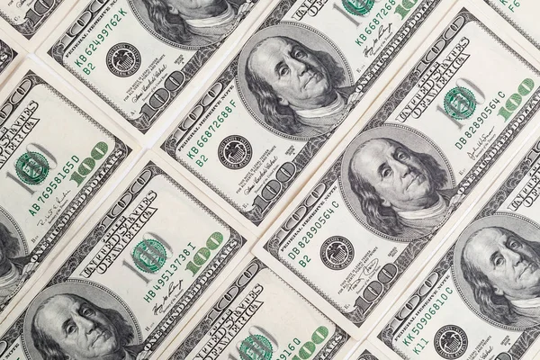 Amerikan doları dokusu. Yüz dolarlık banknotların arka planı.