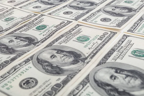 Amerikan doları dokusu. Yüz dolarlık banknotların arka planı.