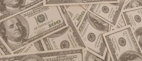 Dokuma Amerikan doları manzarası. Yüz dolarlık banknotların arka planı.