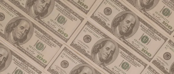 Dokuma Amerikan doları manzarası. Yüz dolarlık banknotların arka planı.