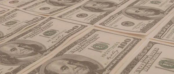 Dokuma Amerikan doları manzarası. Yüz dolarlık banknotların arka planı.