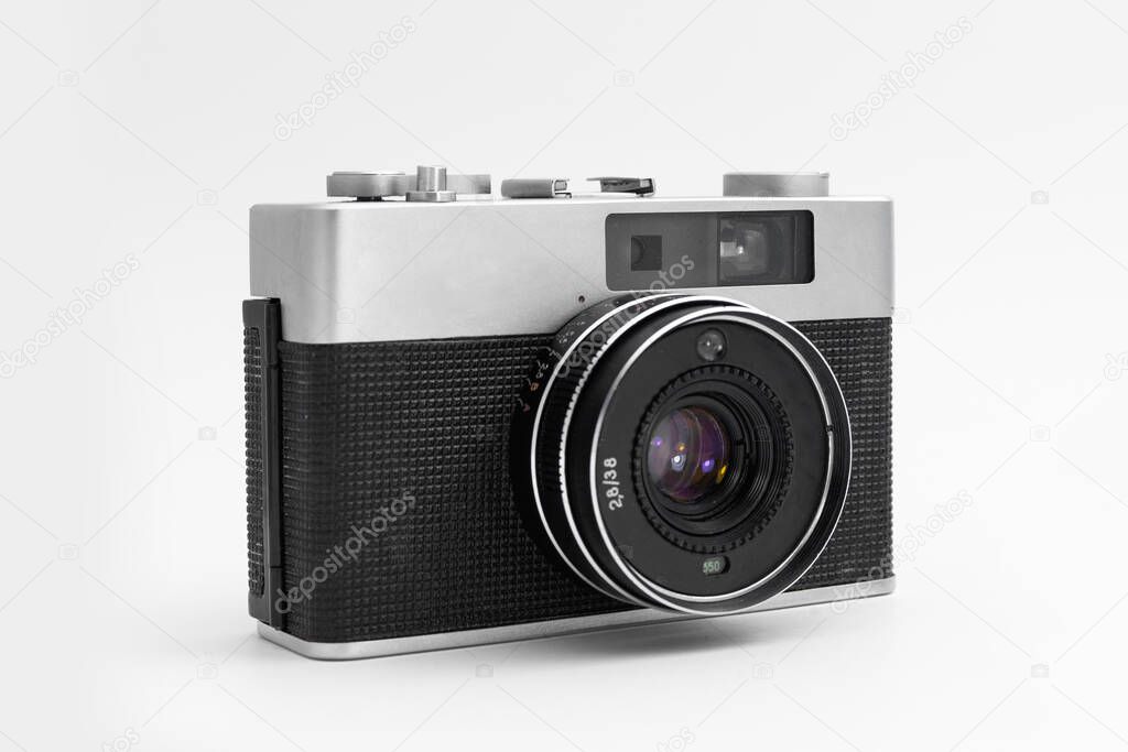 retro film camera on an isolated white backgroun