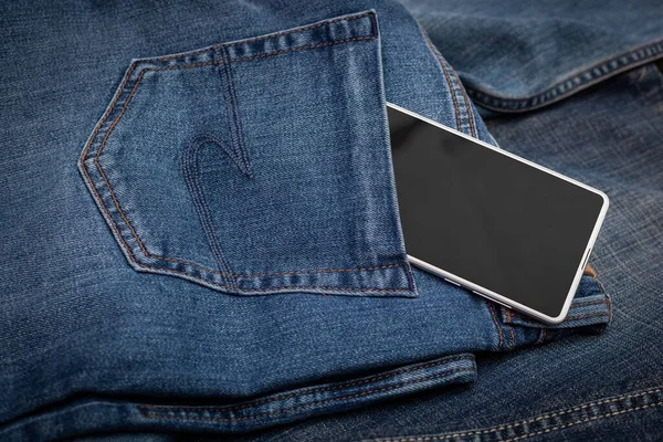 Weißes Handy Auf Blauer Jeans — Stockfoto