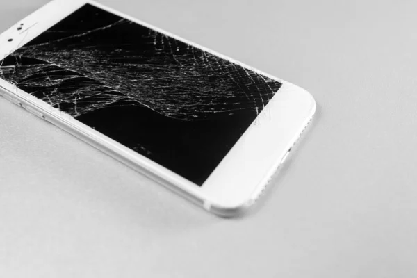 broken mobile phone display on a white background