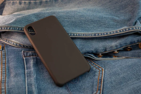 Flerfärgad Mobiltelefon Fall Denim Bakgrund — Stockfoto