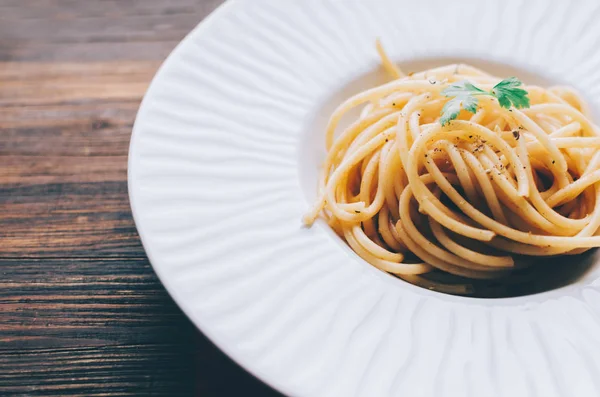 Stock image Pasta with parsley on plate 