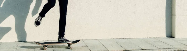 Young man riding skateboard