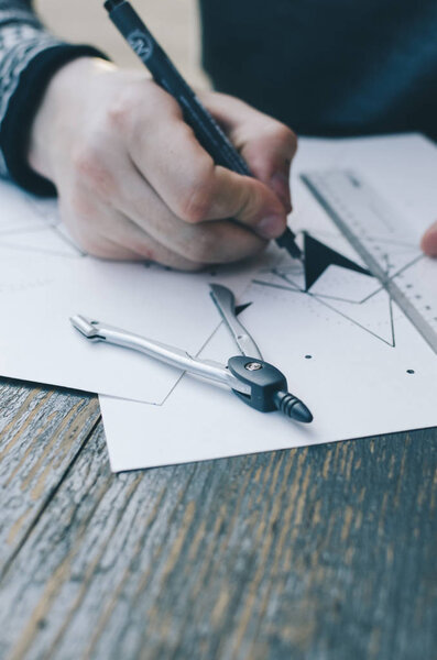 Man Drawing A Sketch