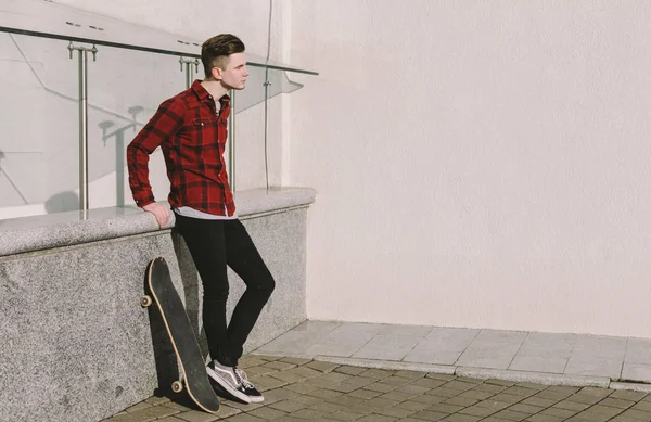 Young Man with Skateboard